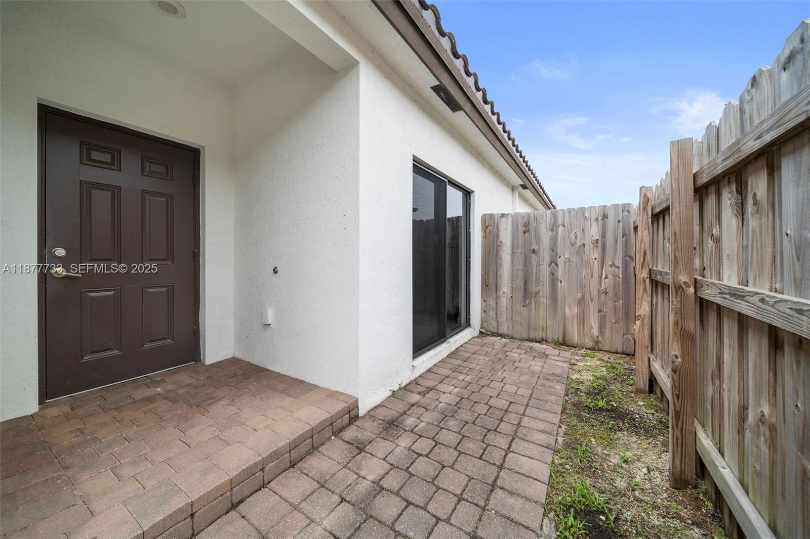 12833 Southwest 229th Terrace Miami, FL 33170 - Photo 32 of 43 a view of backyard with pathway