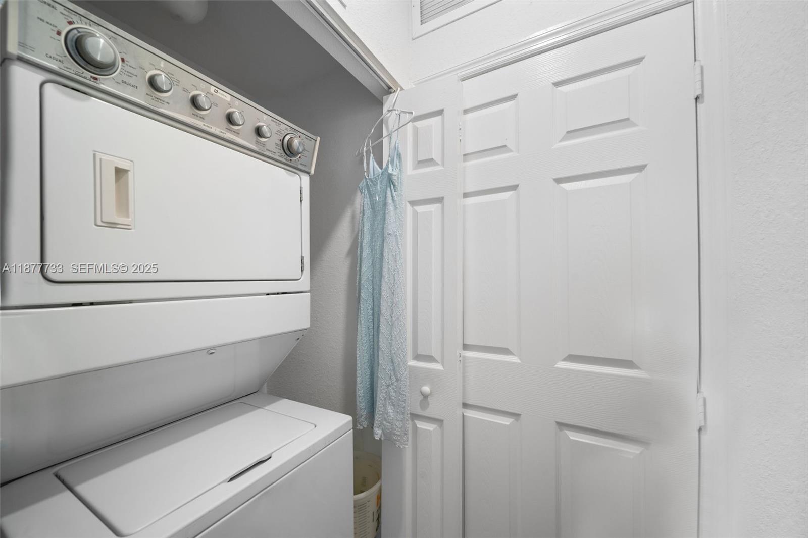 12833 Southwest 229th Terrace Miami, FL 33170 - Photo 42 of 43 a close up of a washer and dryer