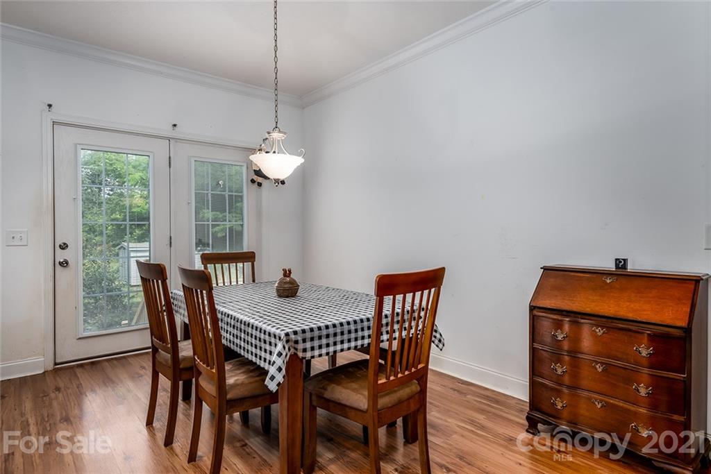 4478 Hickory Nut Ridge Road Hudson, NC 28638 - Photo 23 of 29 a dining room with furniture and window