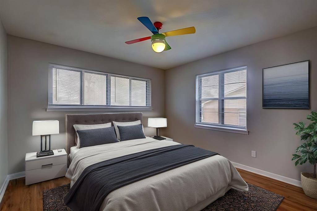 1004 Pecan Avenue Wills Point, TX 75169 - Photo 15 of 21 a bedroom with a bed and a potted plant