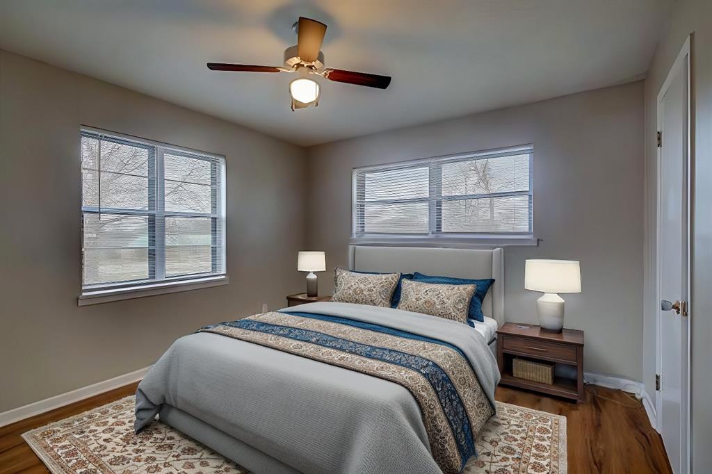 1004 Pecan Avenue Wills Point, TX 75169 - Photo 16 of 21 a bedroom with a bed and a window
