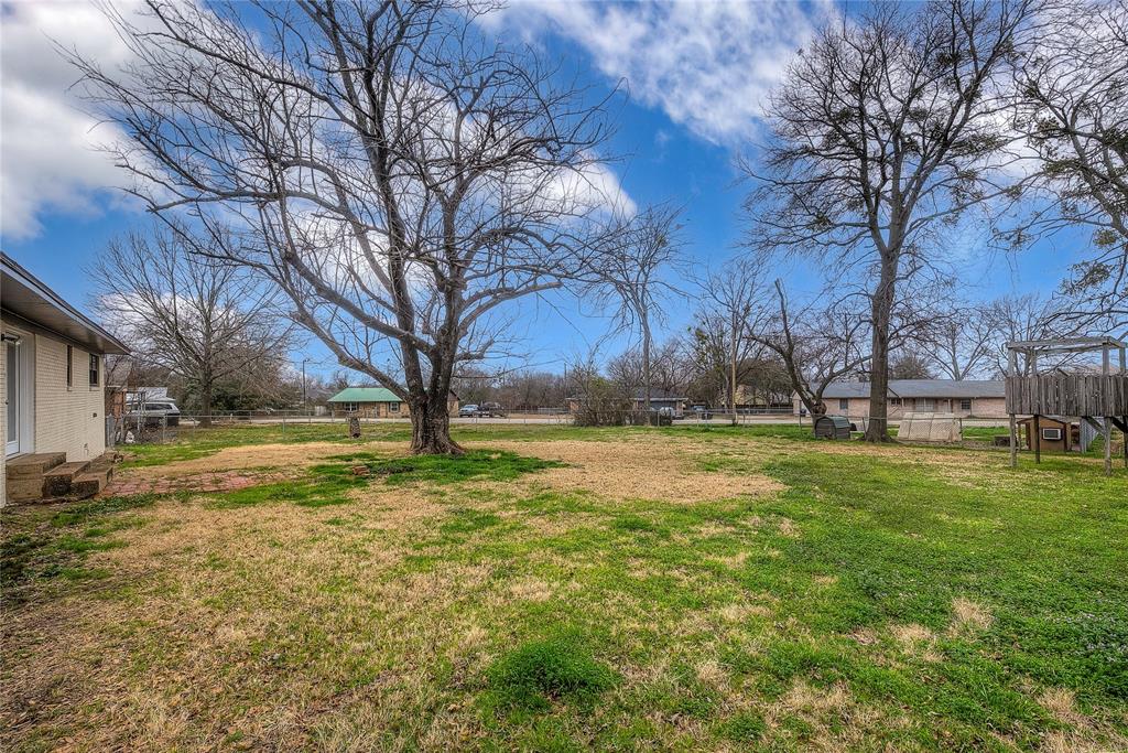 1004 Pecan Avenue Wills Point, TX 75169 - Photo 19 of 21 a view of yard with trees