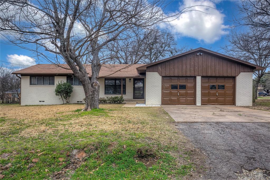 1004 Pecan Avenue Wills Point, TX 75169 - Photo 21 of 21 a house with trees in the background