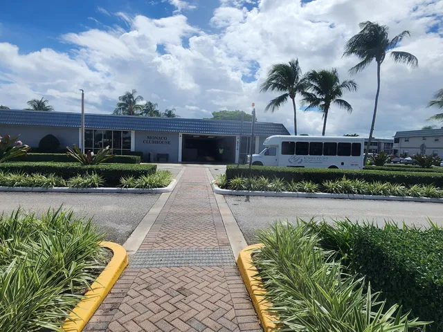 a view of a garden with a fountain
