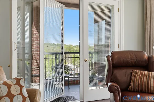 a group of people sitting in front of a building