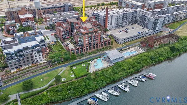 a dining room with furniture window and wooden floor