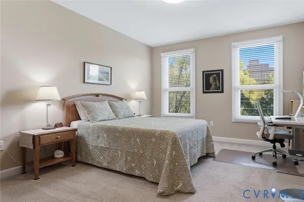 a kitchen with granite countertop a sink stainless steel appliances and cabinets