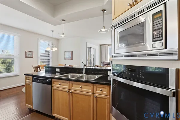 a front view of a building with a yard