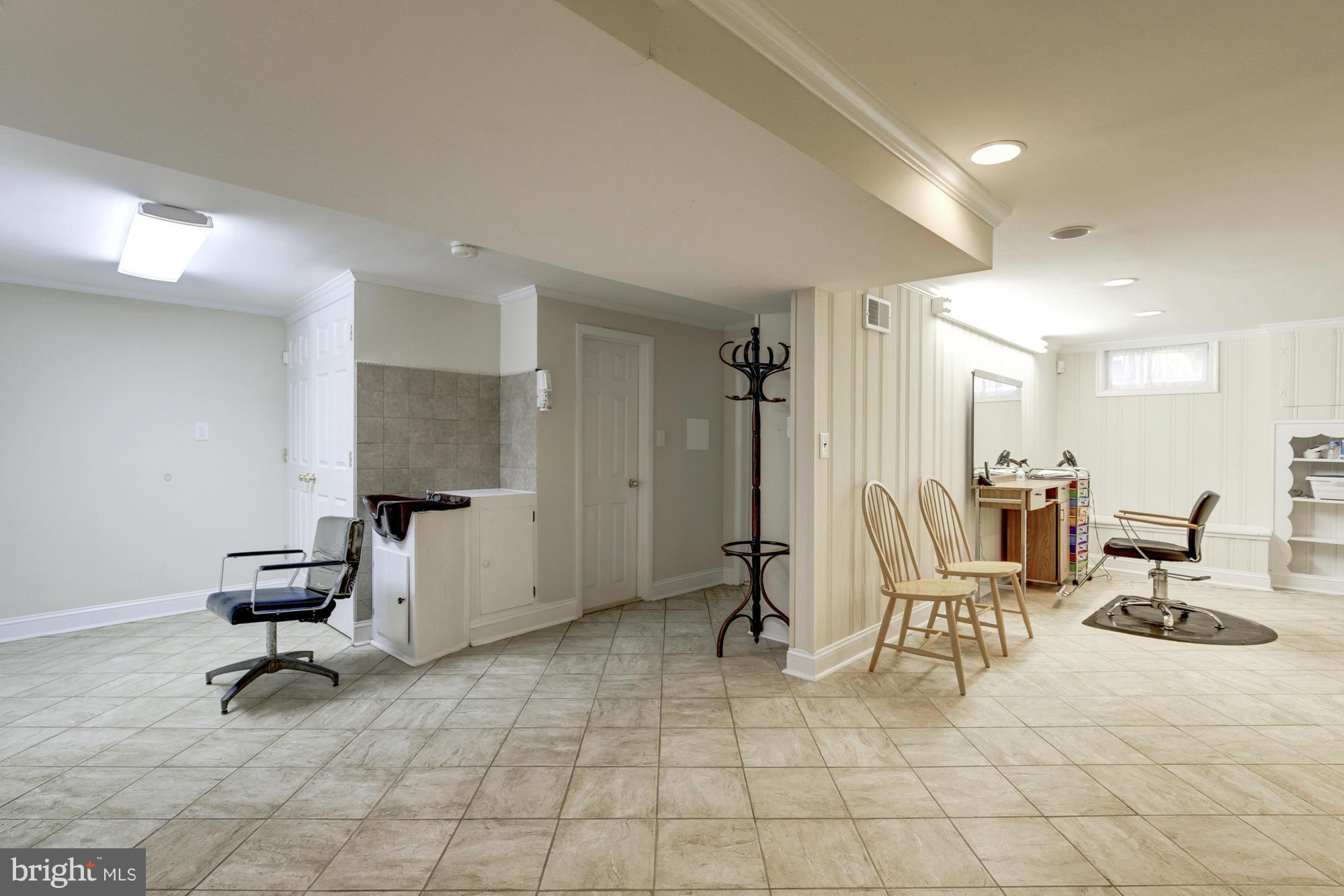 1305 Oakview Drive Silver Spring, MD 20903 - Photo 17 of 26 a view of a room with gym equipment