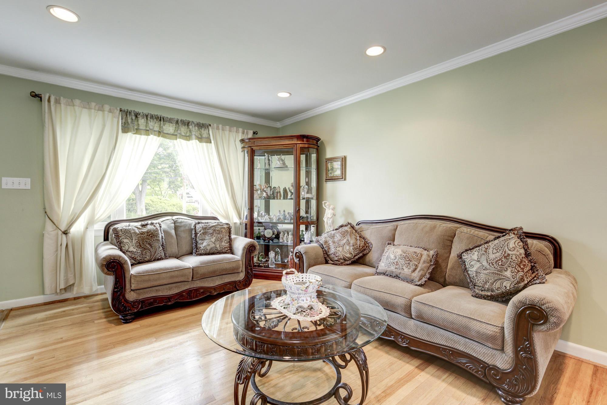 1305 Oakview Drive Silver Spring, MD 20903 - Photo 3 of 26 a living room with furniture and a large window