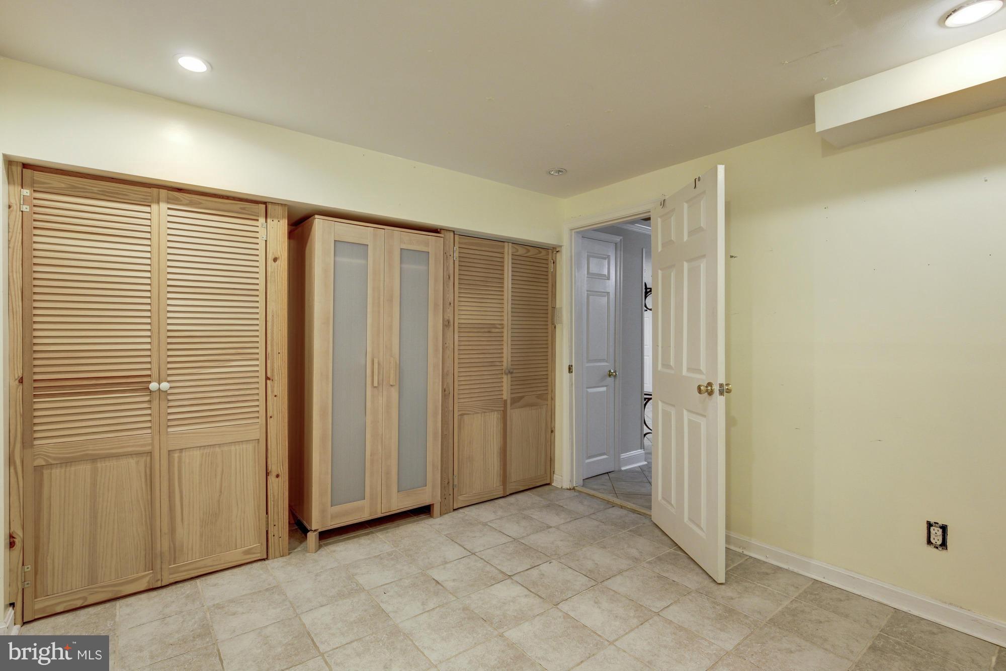 1305 Oakview Drive Silver Spring, MD 20903 - Photo 21 of 26 a view of an empty room with closet area