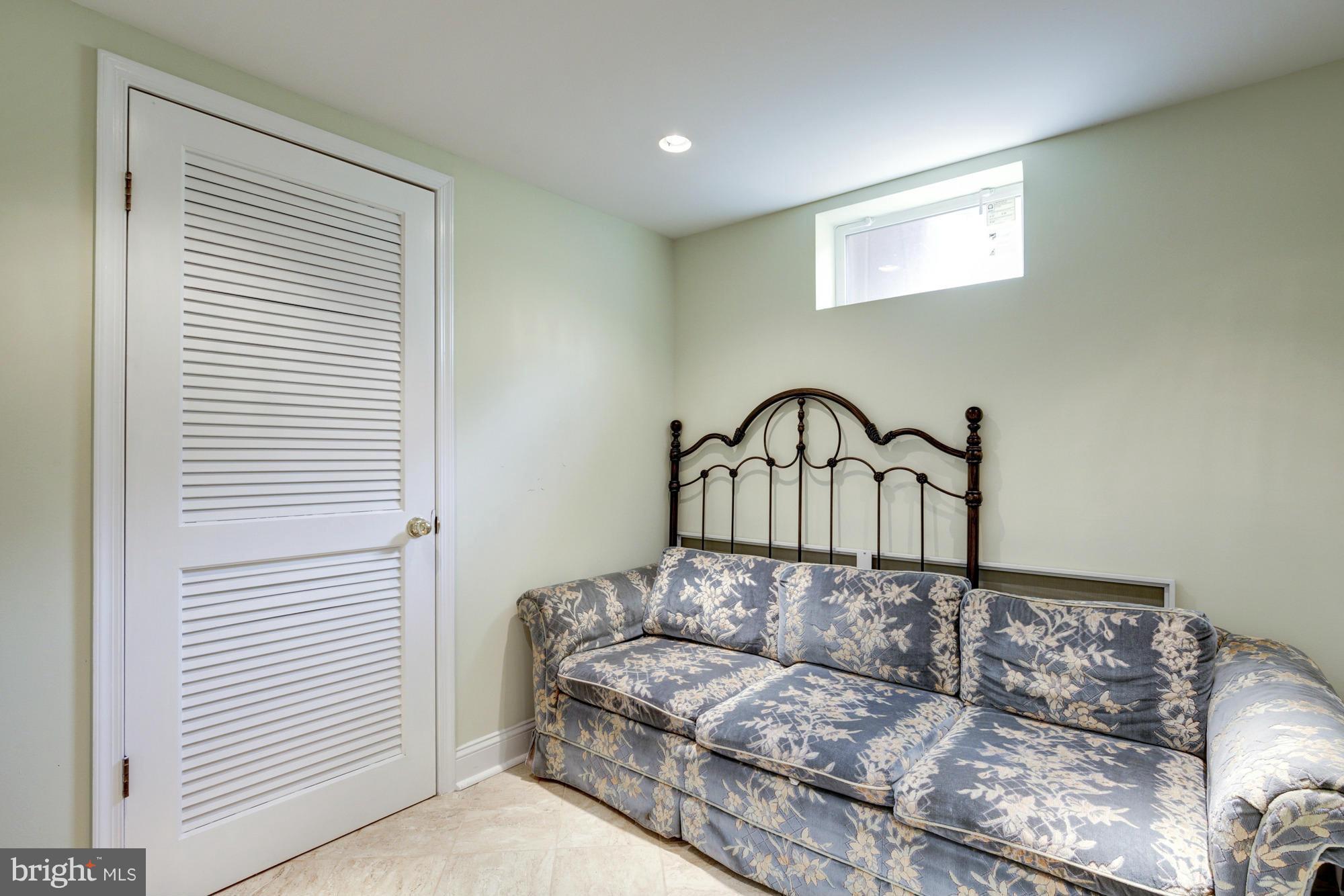 1305 Oakview Drive Silver Spring, MD 20903 - Photo 22 of 26 a living room with a couch