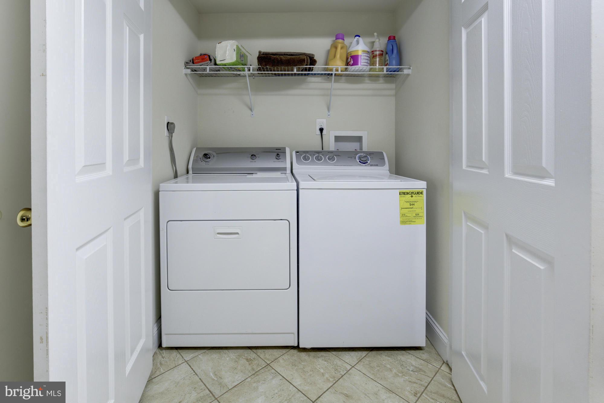 1305 Oakview Drive Silver Spring, MD 20903 - Photo 23 of 26 a utility room with dryer and washer