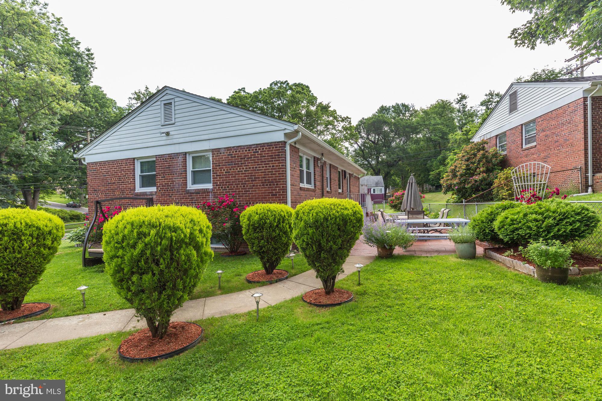 1305 Oakview Drive Silver Spring, MD 20903 - Photo 25 of 26 a view of a house with backyard and porch
