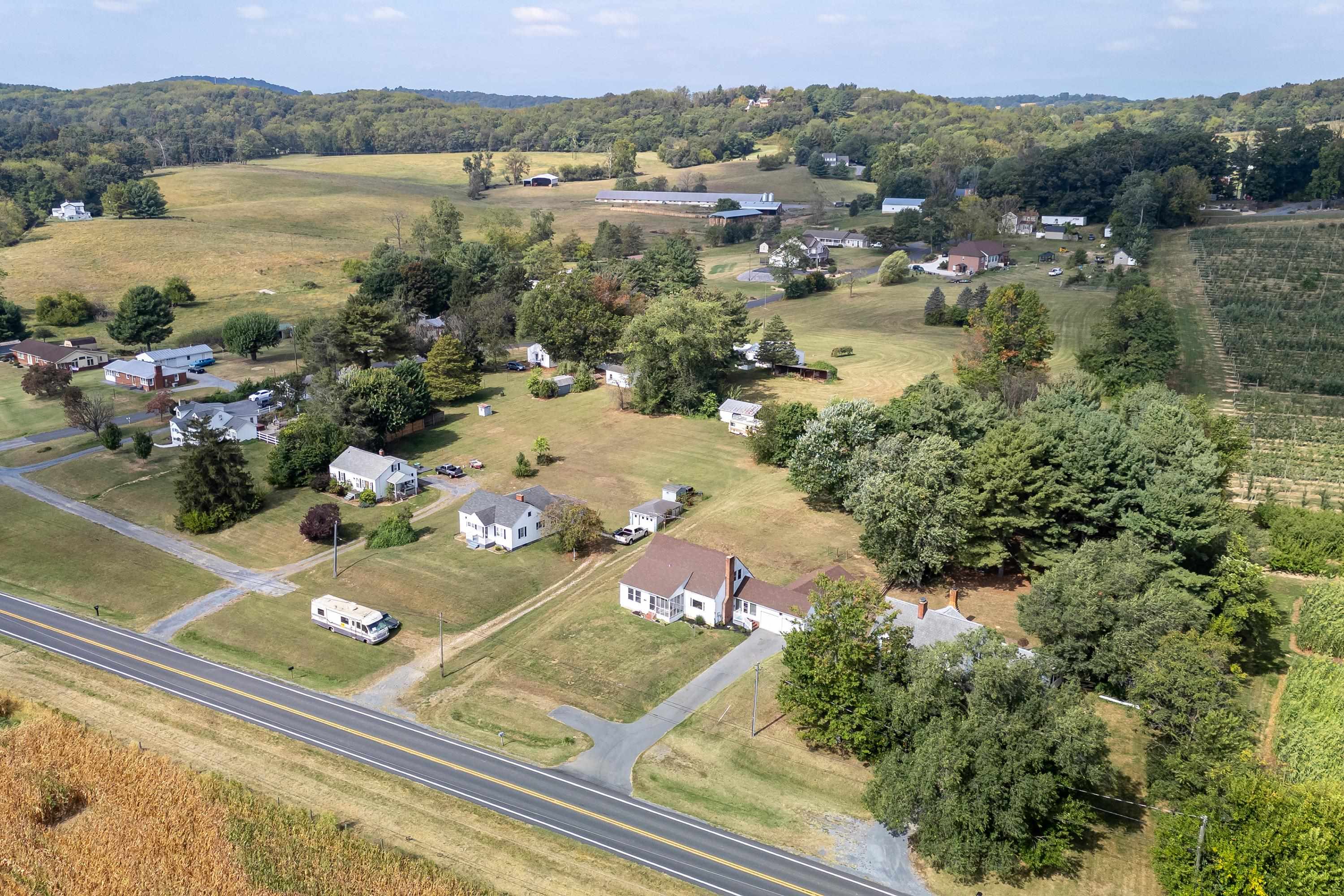 3138 Cross Keys Road Harrisonburg, VA 22801 - Photo 70 of 74 The aerial view highlights the overhead view of the spacious lot, farmland nearby the home, mountains offering beautiful views, and much more!