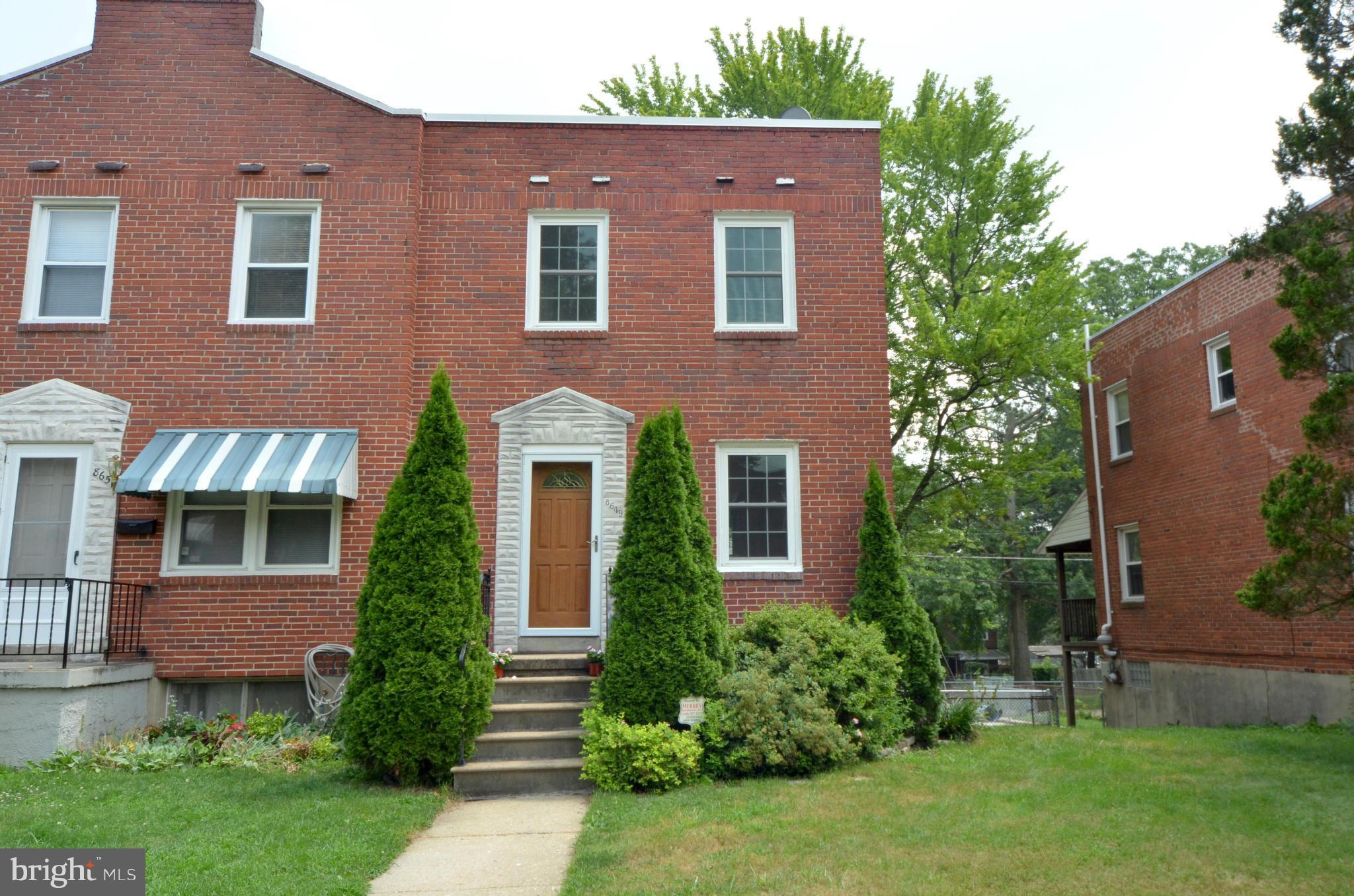 8649 Oak Road Baltimore, MD 21234 - Photo 1 of 30 front view of house with a yard and potted plants