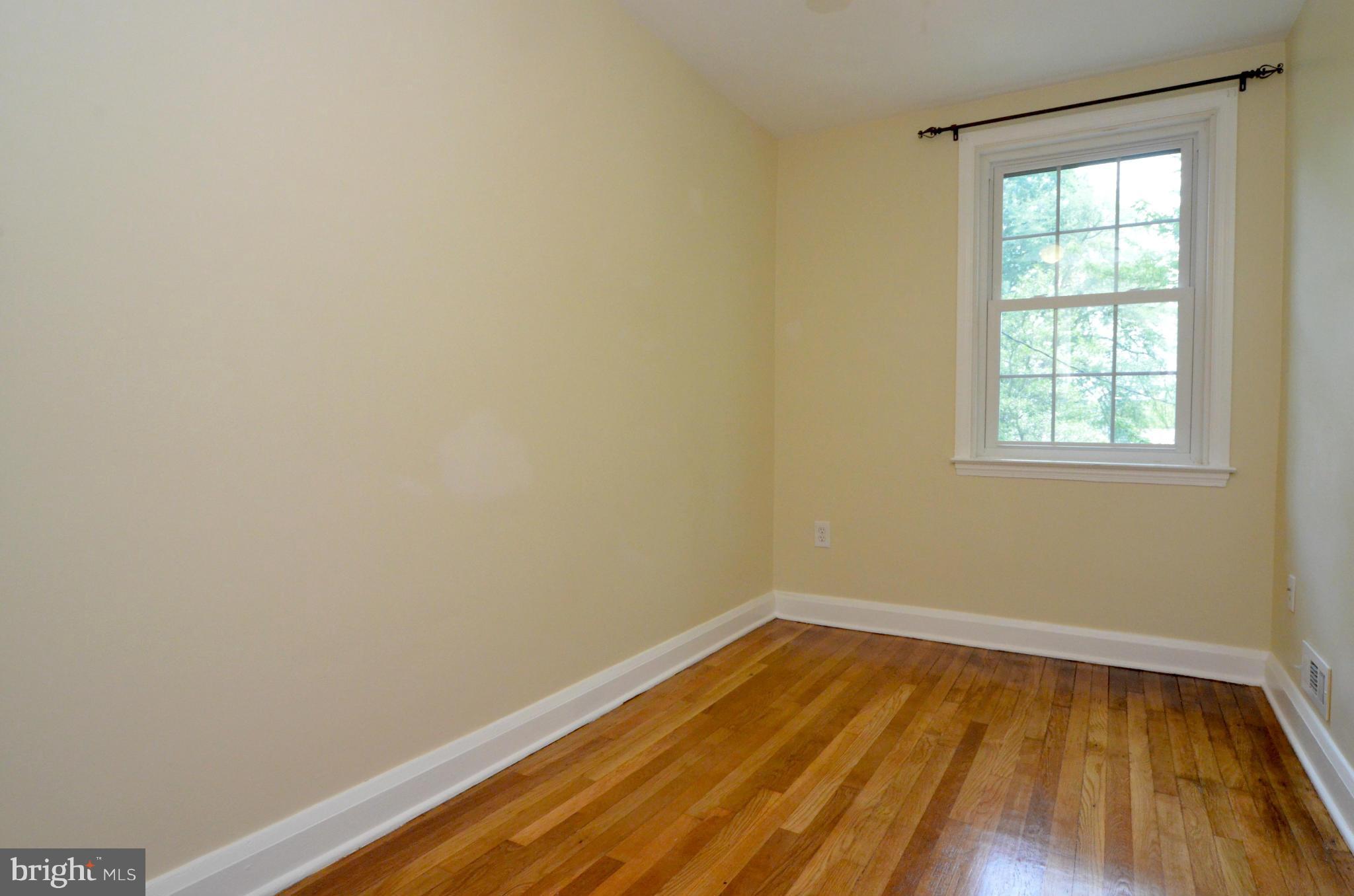 8649 Oak Road Baltimore, MD 21234 - Photo 13 of 30 a view of a room with wooden floor and small window