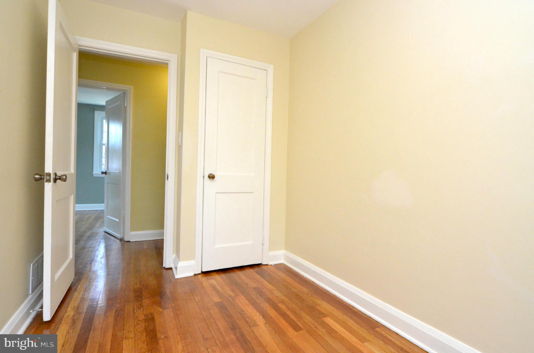8649 Oak Road Baltimore, MD 21234 - Photo 14 of 30 a view of a hallway with wooden floor