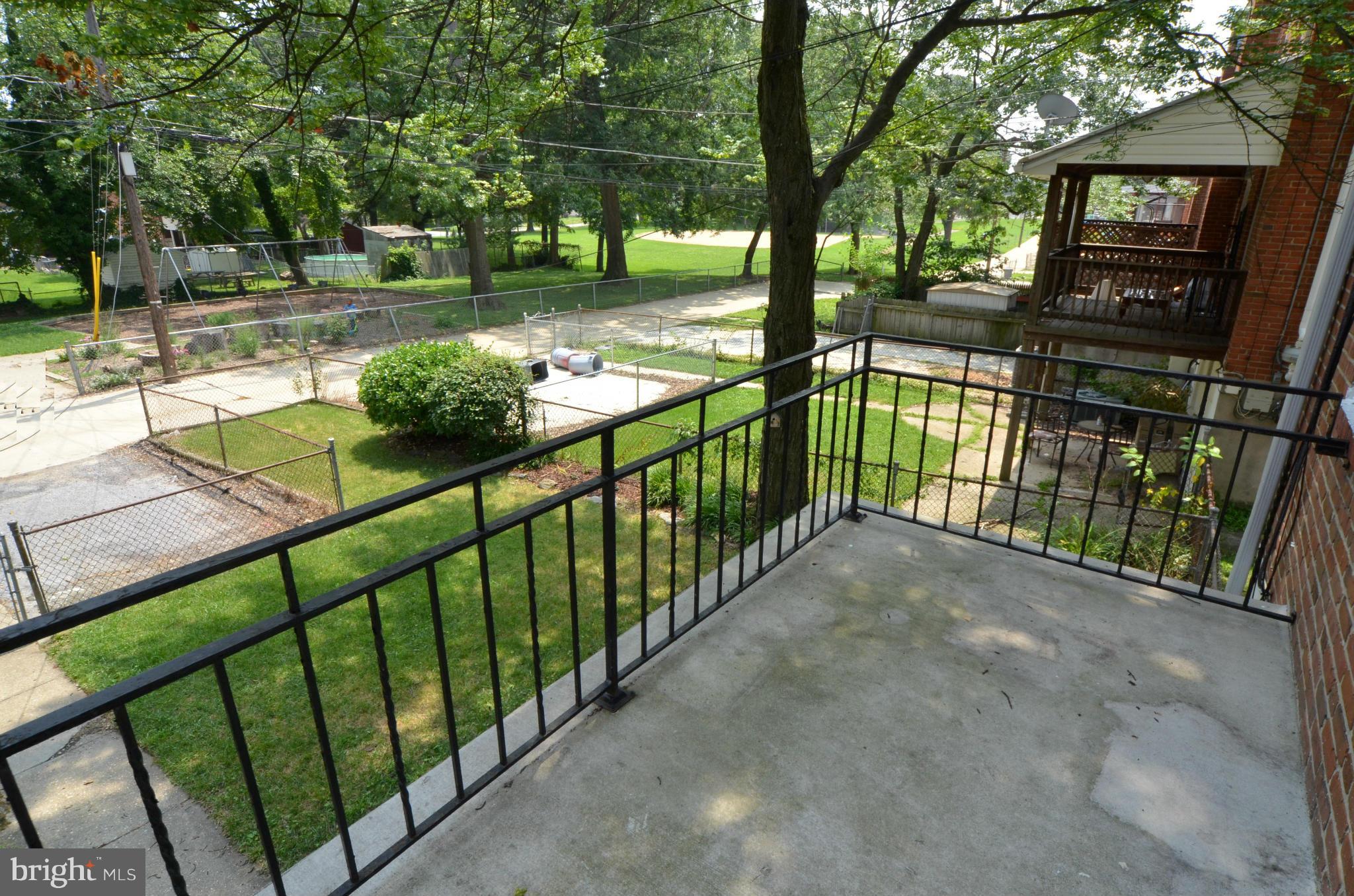 8649 Oak Road Baltimore, MD 21234 - Photo 21 of 30 a view of a porch with a yard