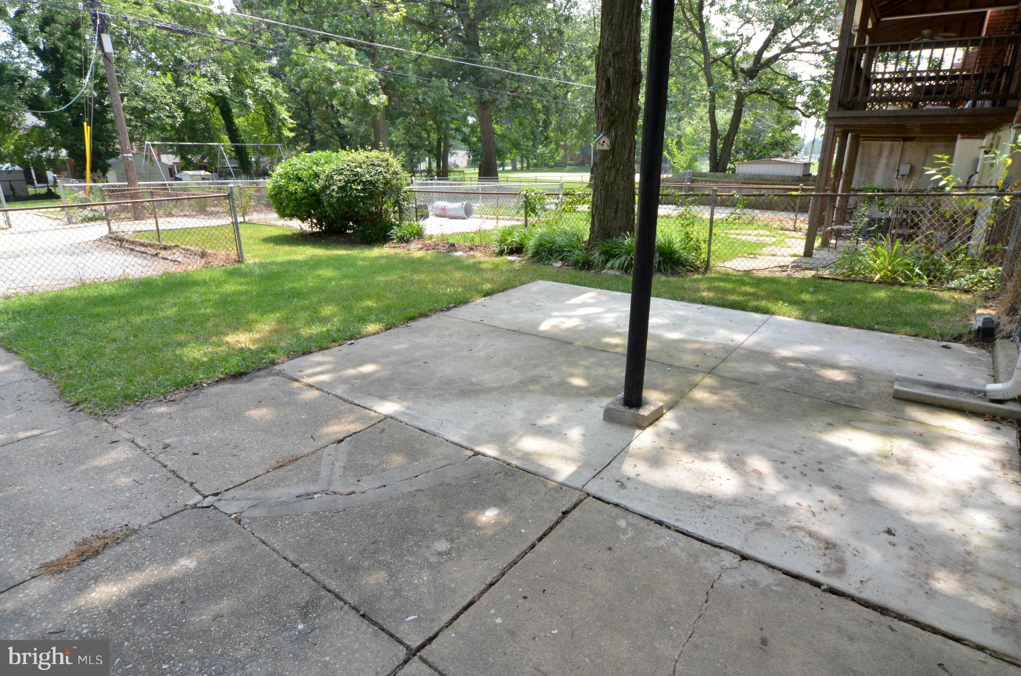 8649 Oak Road Baltimore, MD 21234 - Photo 23 of 30 a view of a street with sitting area