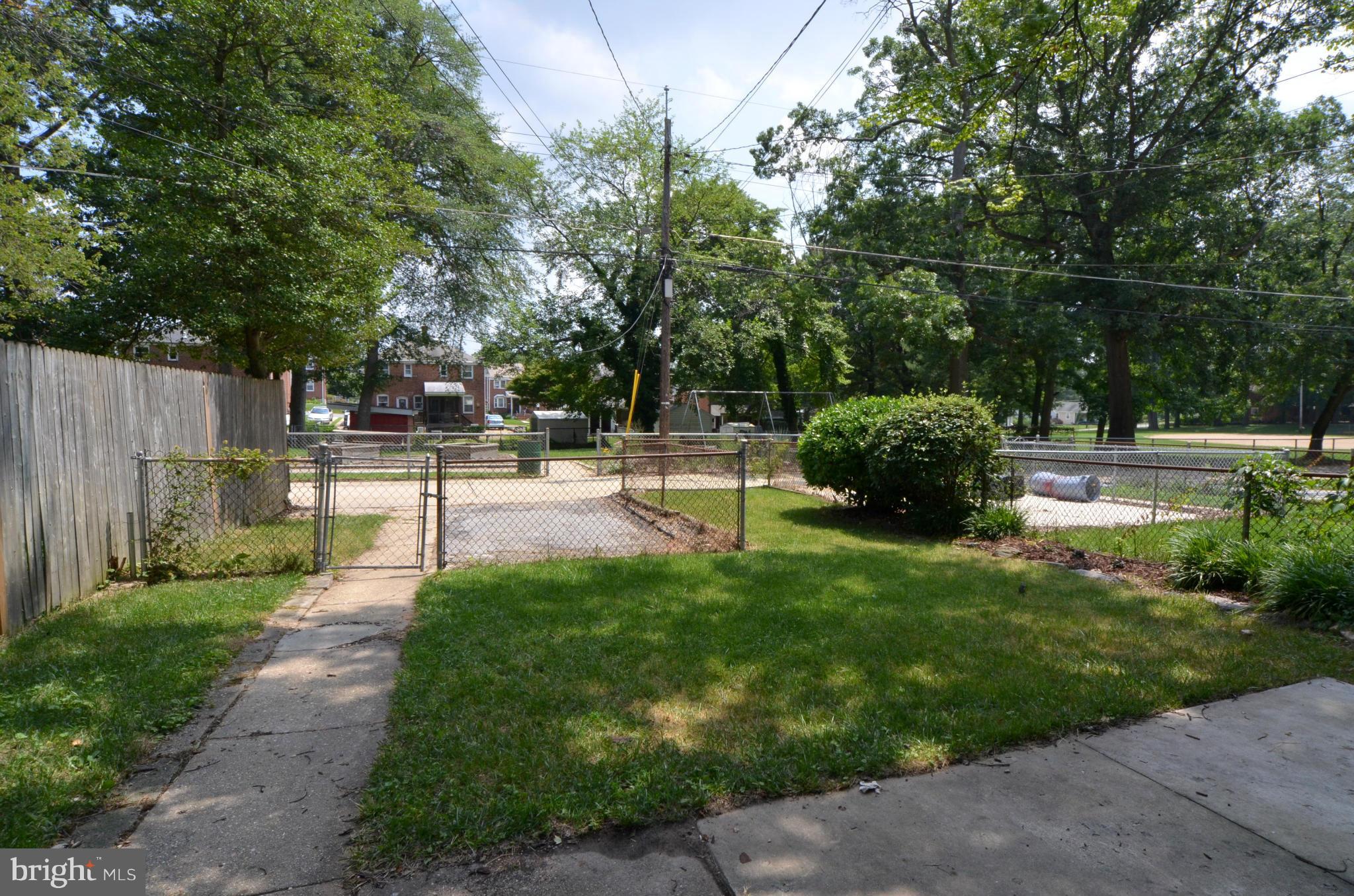 8649 Oak Road Baltimore, MD 21234 - Photo 24 of 30 a view of a backyard with sitting area