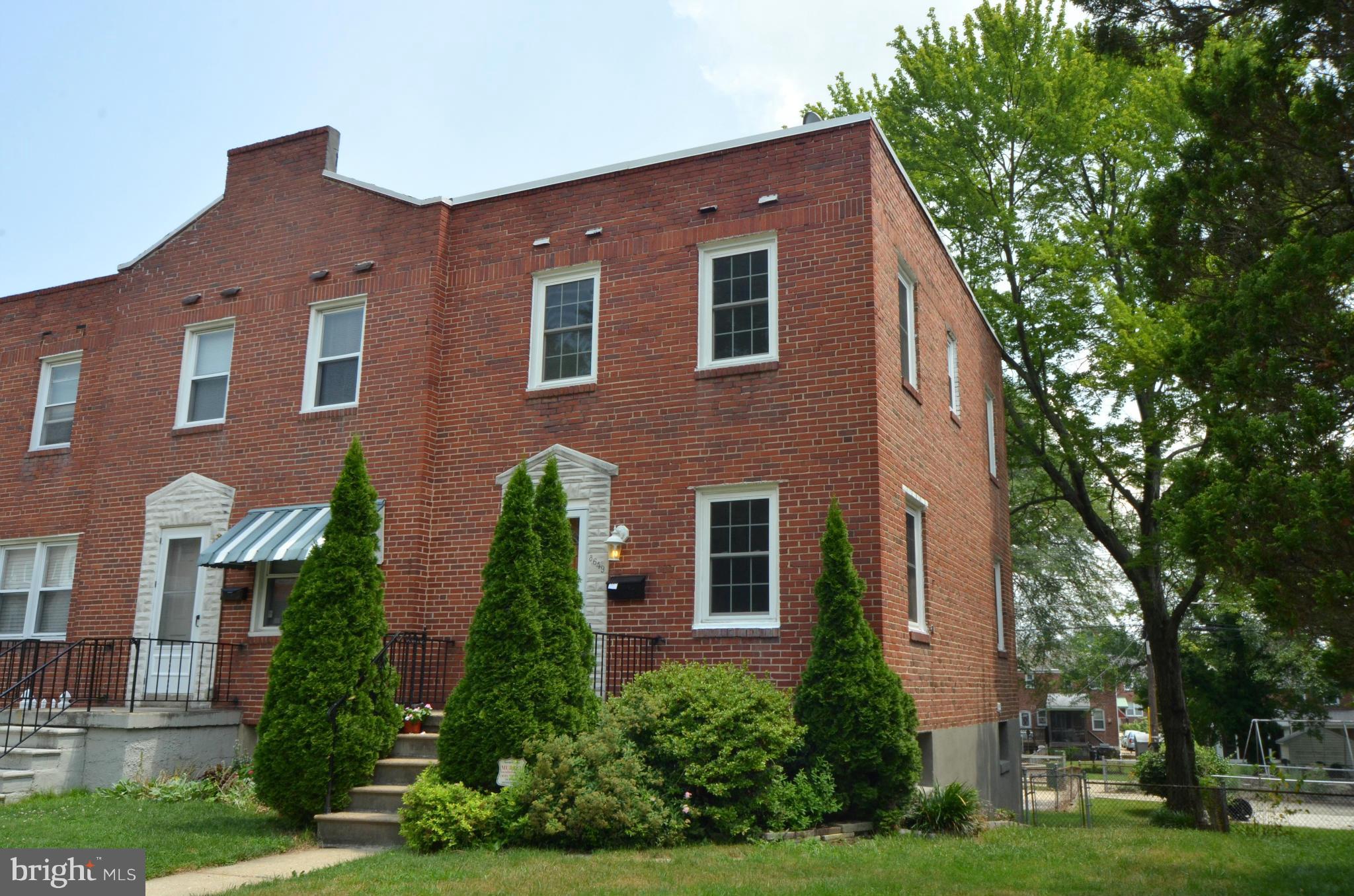 8649 Oak Road Baltimore, MD 21234 - Photo 26 of 30 a front view of a house with garden