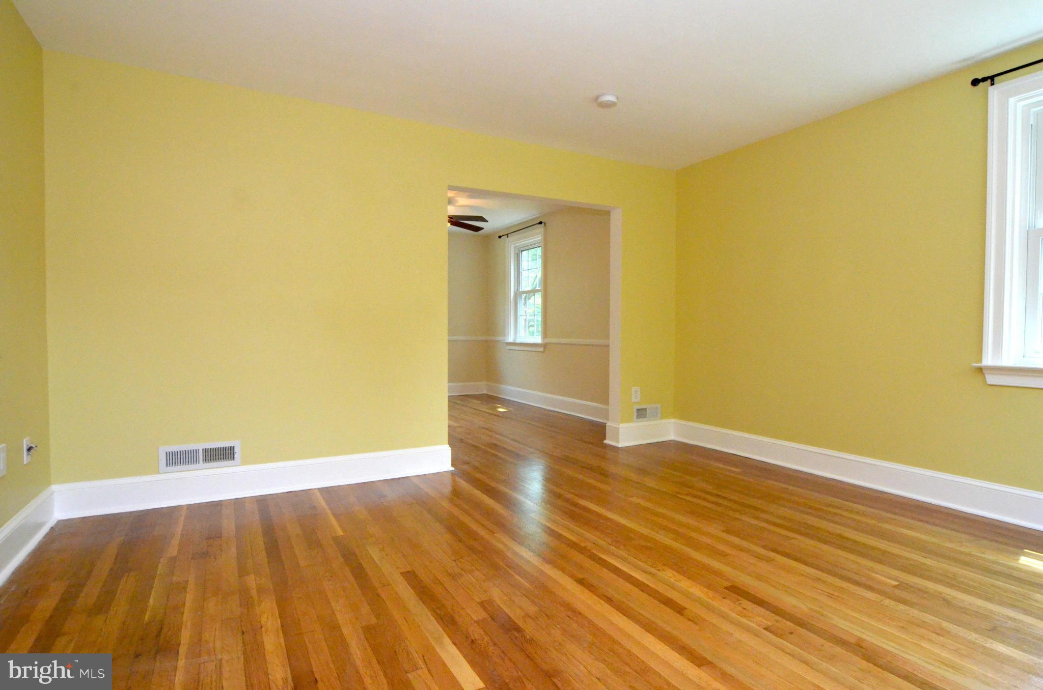 8649 Oak Road Baltimore, MD 21234 - Photo 4 of 30 a view of empty room with wooden floor