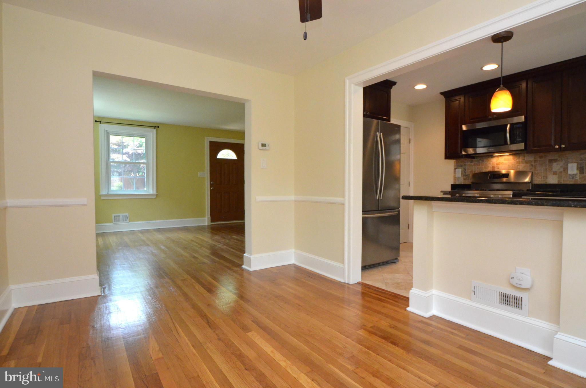8649 Oak Road Baltimore, MD 21234 - Photo 5 of 30 a view of a kitchen cabinets and wooden floor