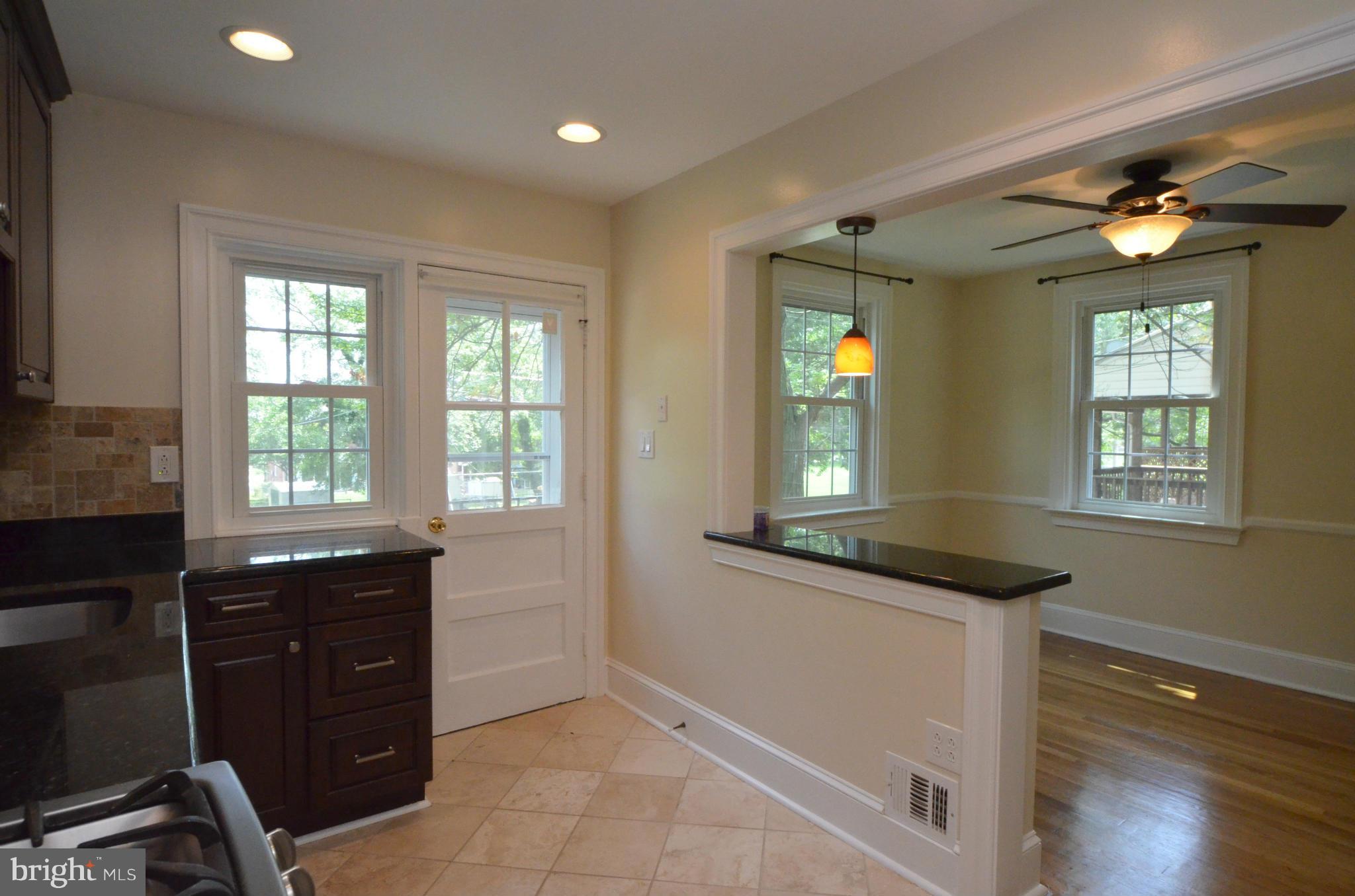 8649 Oak Road Baltimore, MD 21234 - Photo 8 of 30 a kitchen with a sink and a window