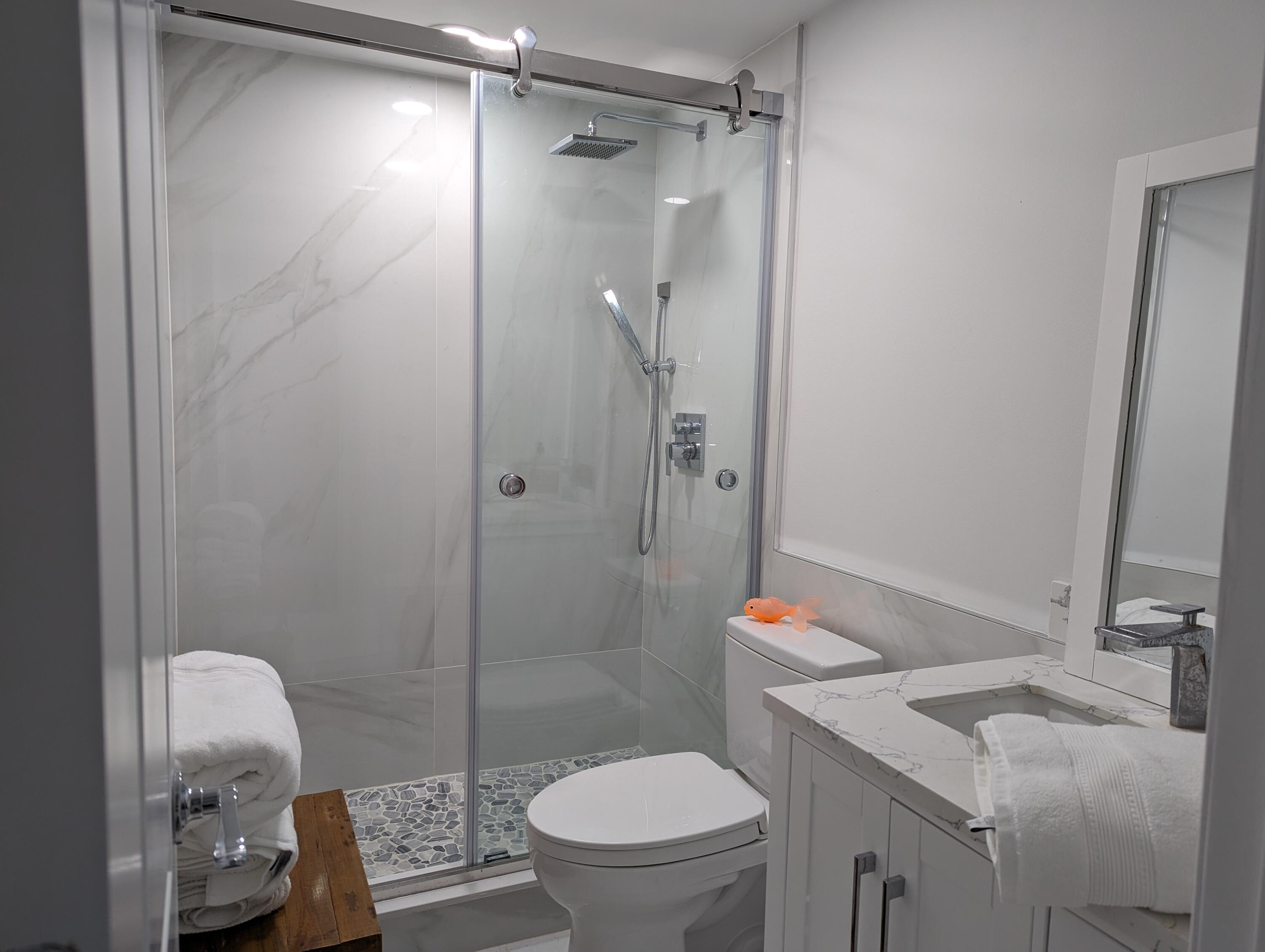 2840 South Ocean Boulevard, Unit 3230 Palm Beach, FL 33480 - Photo 12 of 18 a bathroom with a sink toilet and shower