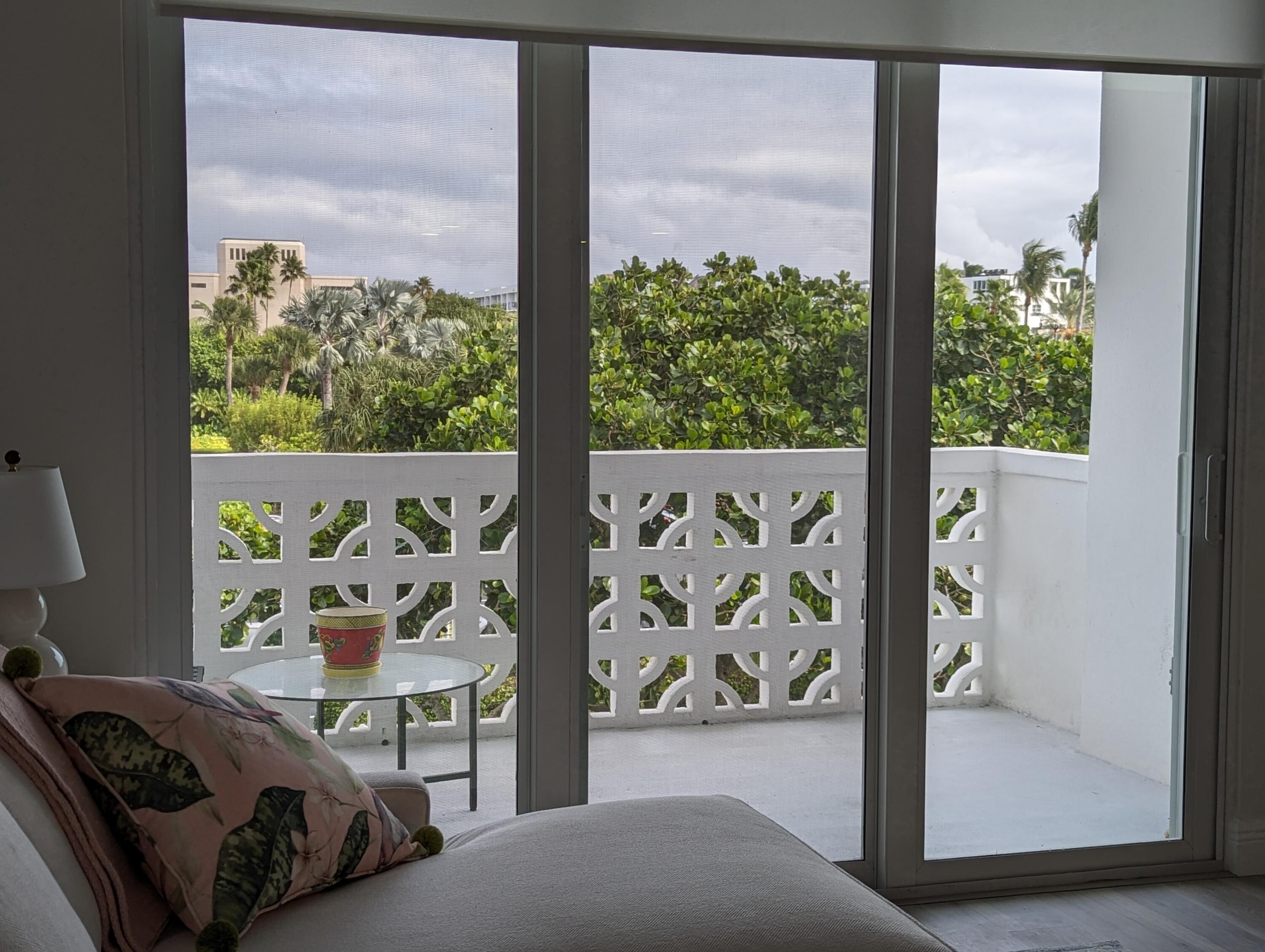 2840 South Ocean Boulevard, Unit 3230 Palm Beach, FL 33480 - Photo 9 of 18 a bedroom with a bed and a window