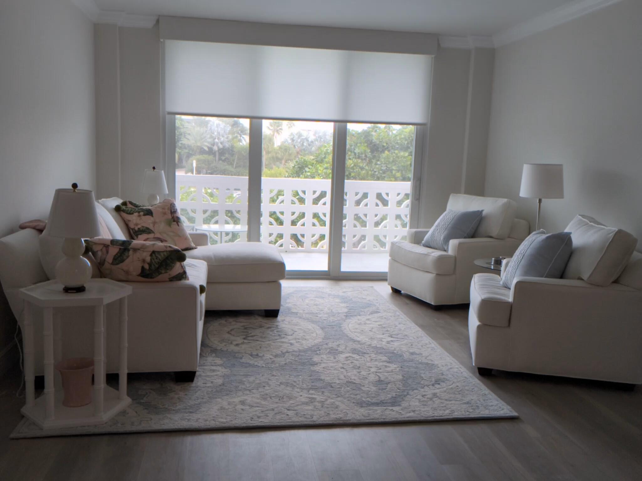2840 South Ocean Boulevard, Unit 3230 Palm Beach, FL 33480 - Photo 10 of 18 a living room with furniture and a large window