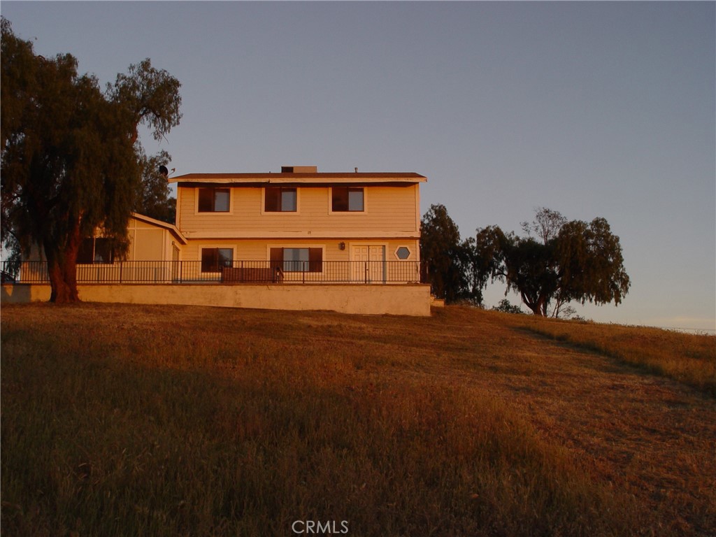 38400 San Ignacio Road Hemet, CA 92544 - Photo 12 of 12 a front view of a house with a yard