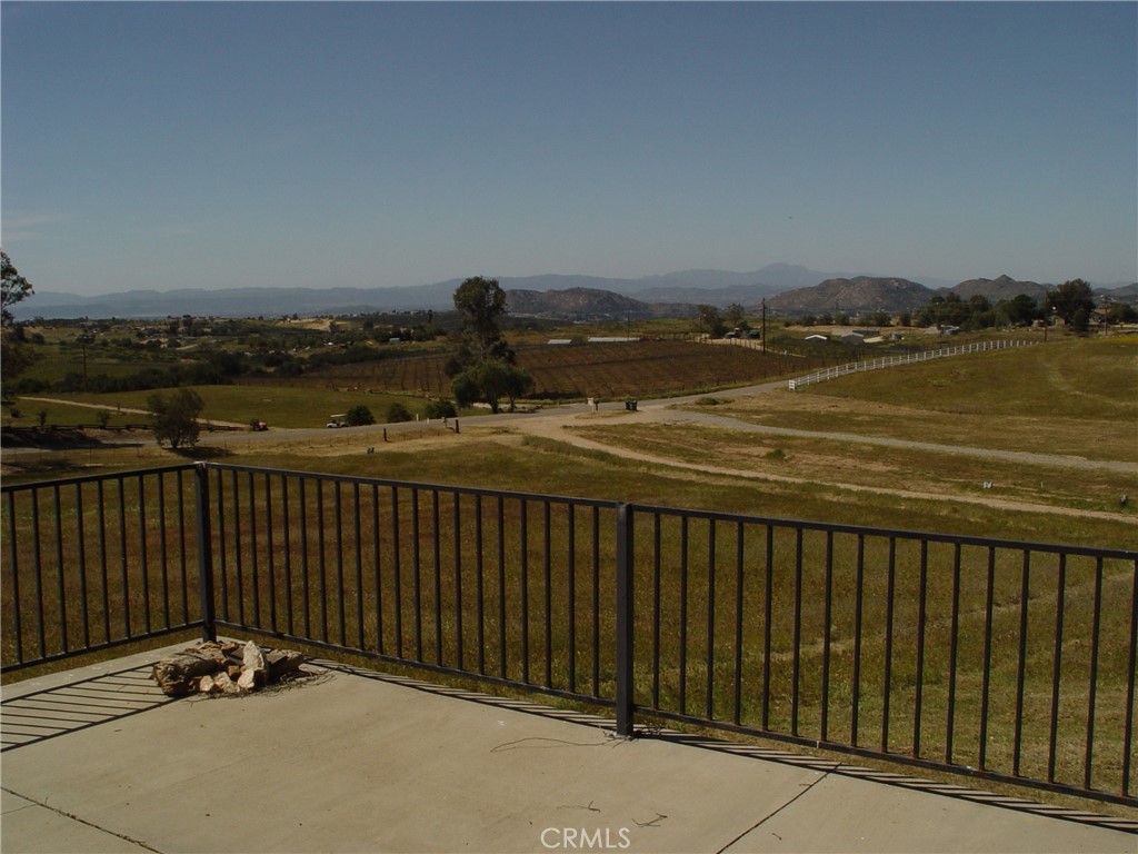 38400 San Ignacio Road Hemet, CA 92544 - Photo 6 of 12 a terrace with a bench