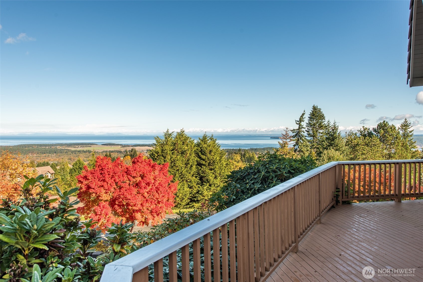 113 Quails Roost Road Sequim, WA 98382 - Photo 14 of 40 a balcony with trees in the background