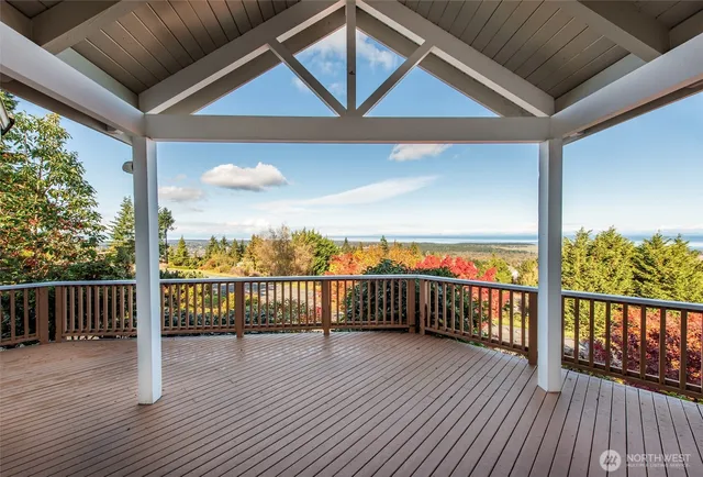 a living room with furniture and windows