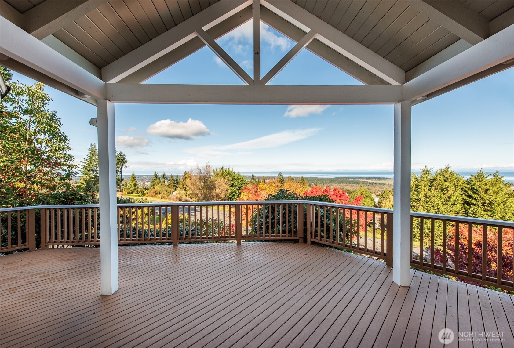 113 Quails Roost Road Sequim, WA 98382 - Photo 15 of 40 a view of a balcony with wooden floor