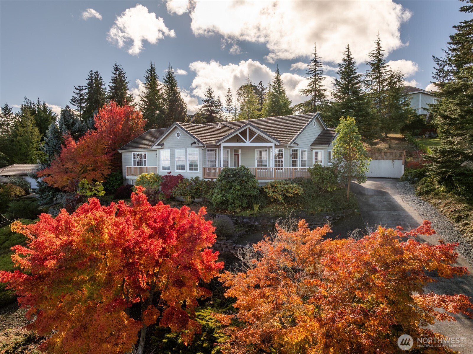 113 Quails Roost Road Sequim, WA 98382 - Photo 2 of 40 a front view of a house with a yard