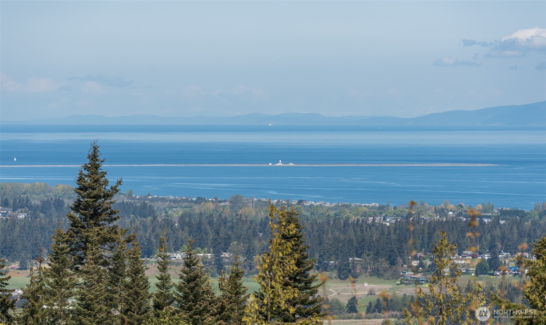 113 Quails Roost Road Sequim, WA 98382 - Photo 3 of 40 a view of a city