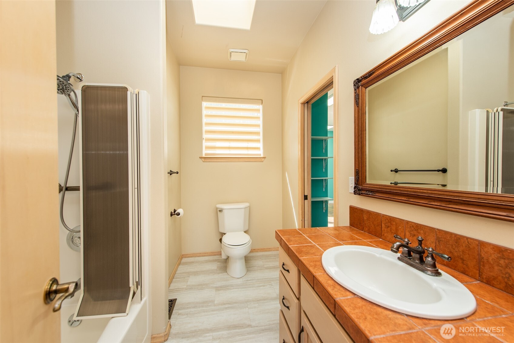 113 Quails Roost Road Sequim, WA 98382 - Photo 33 of 40 a bathroom with a sink and a mirror