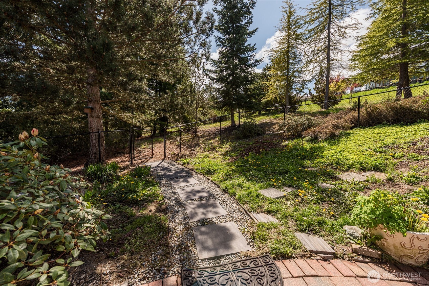 113 Quails Roost Road Sequim, WA 98382 - Photo 37 of 40 a view of a garden with plants and trees