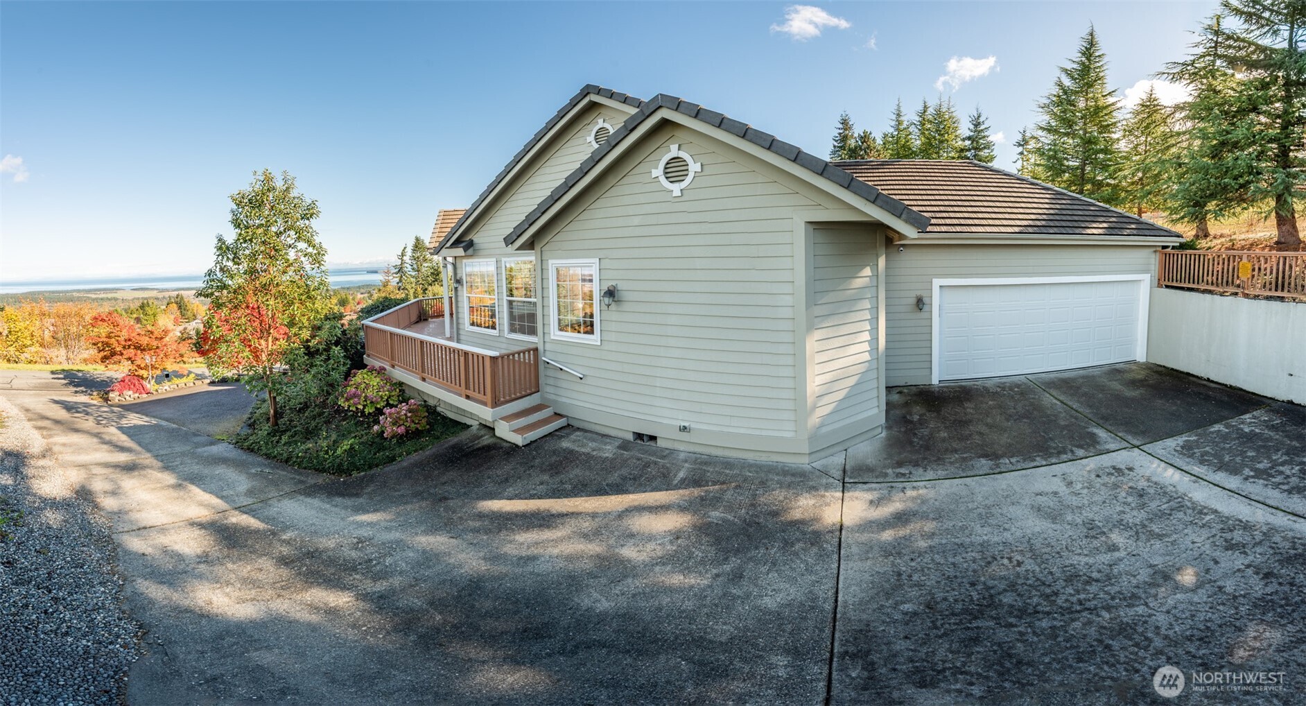 113 Quails Roost Road Sequim, WA 98382 - Photo 38 of 40 a front view of a house with a yard