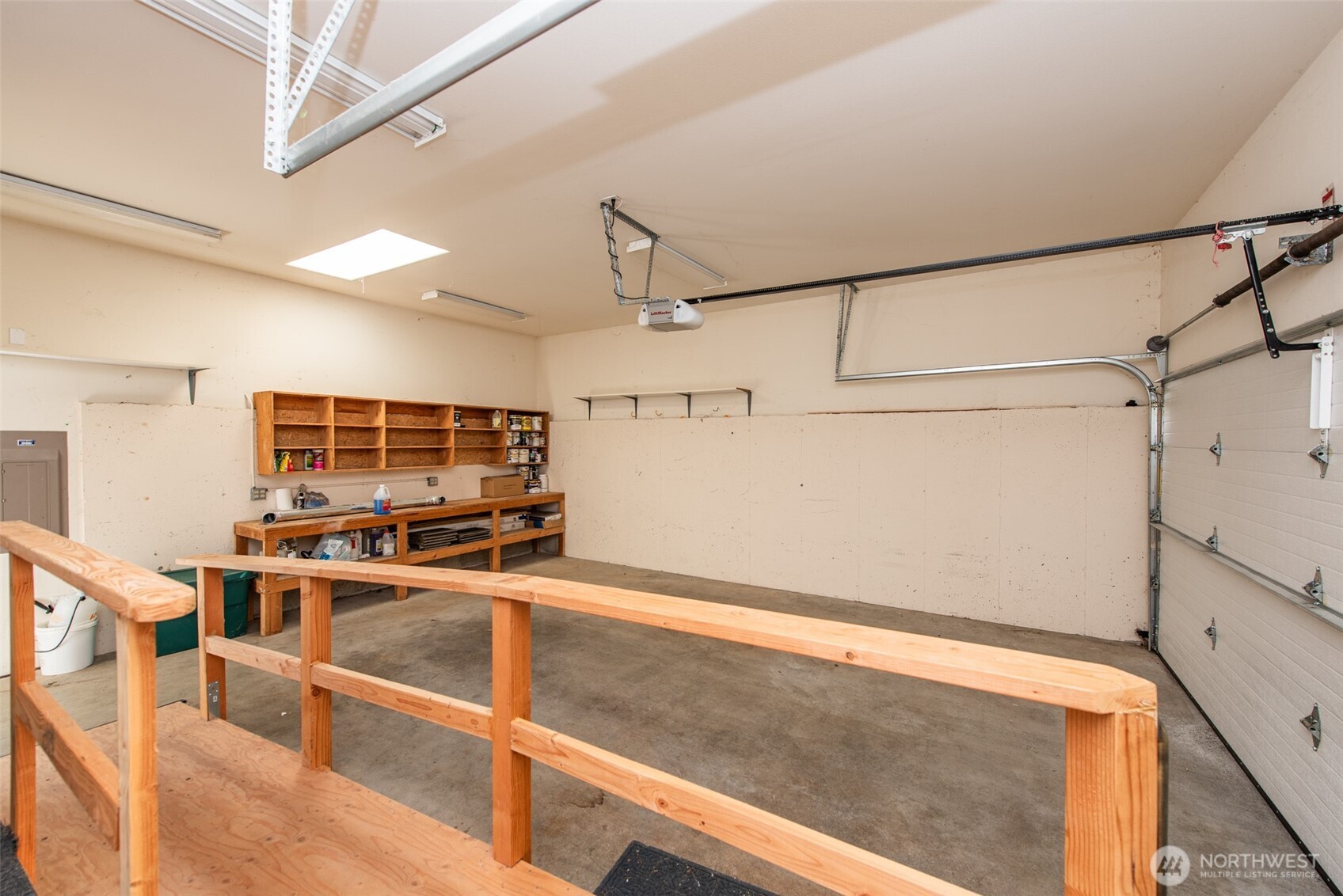 113 Quails Roost Road Sequim, WA 98382 - Photo 39 of 40 a kitchen with kitchen island a stove and a refrigerator