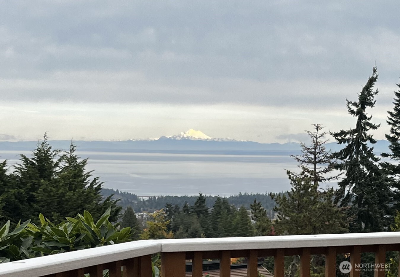 113 Quails Roost Road Sequim, WA 98382 - Photo 6 of 40 a view of lake with mountain in the back