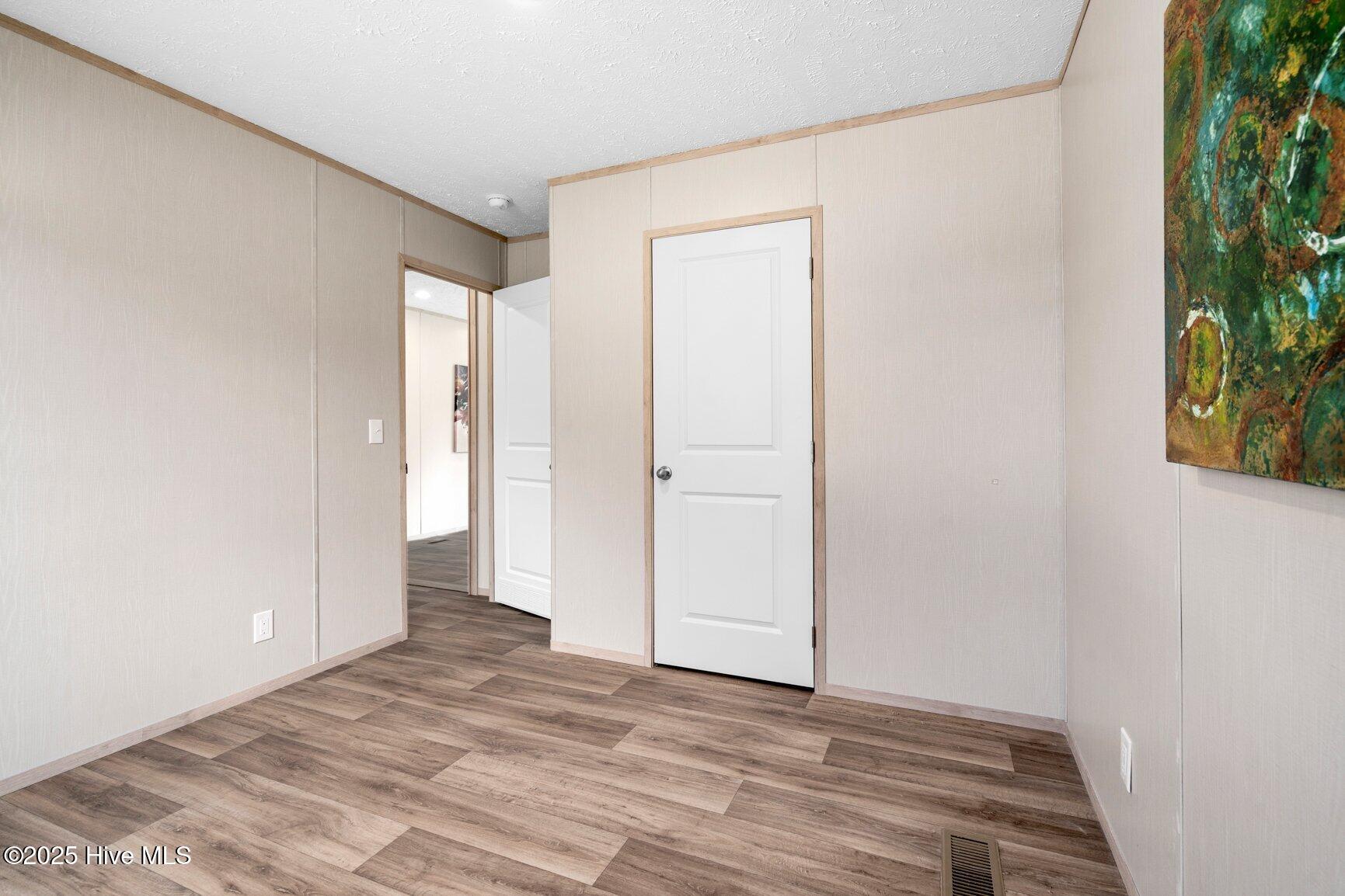 7954 White Oak Road Rocky Mount, NC 27803 - Photo 17 of 34 Bedroom 3 with walk in closet