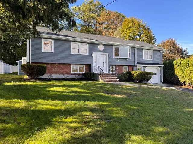 a view of a house with a swimming pool