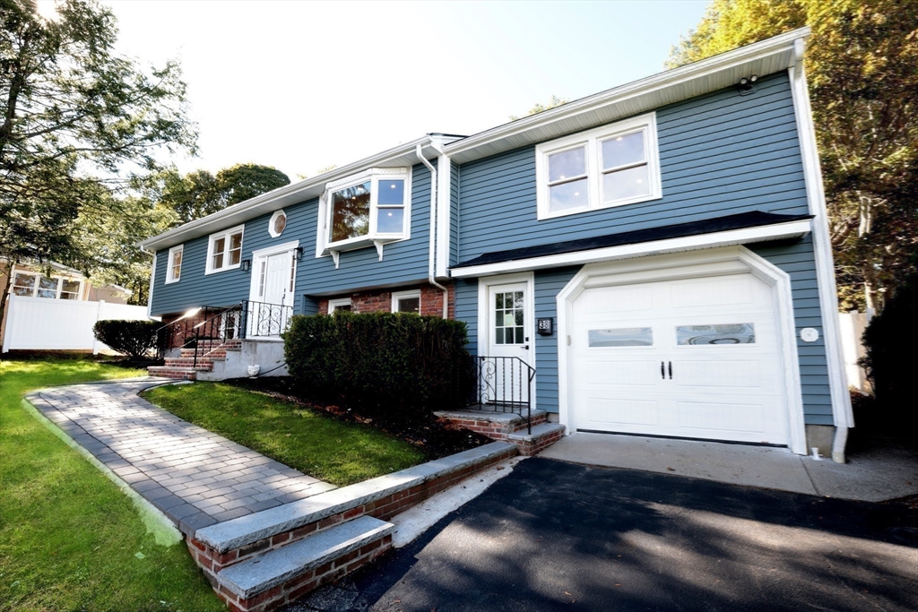38 Middle Street Woburn, MA 01801 - Photo 32 of 39 a view of a house with a yard
