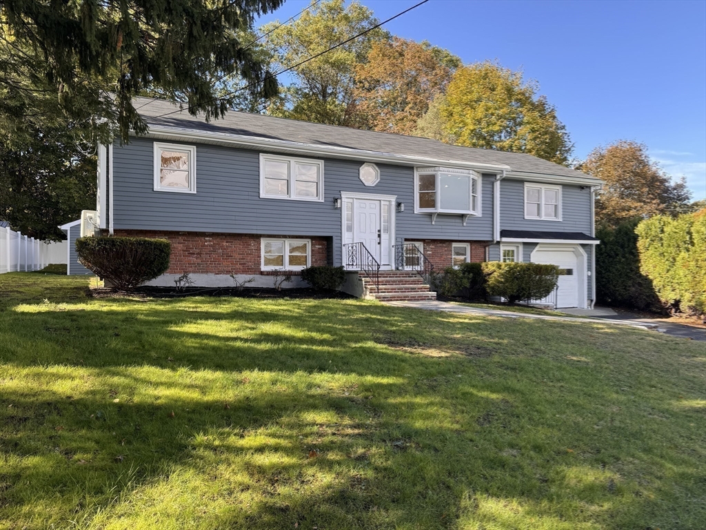 38 Middle Street Woburn, MA 01801 - Photo 33 of 39 a view of a house with a swimming pool