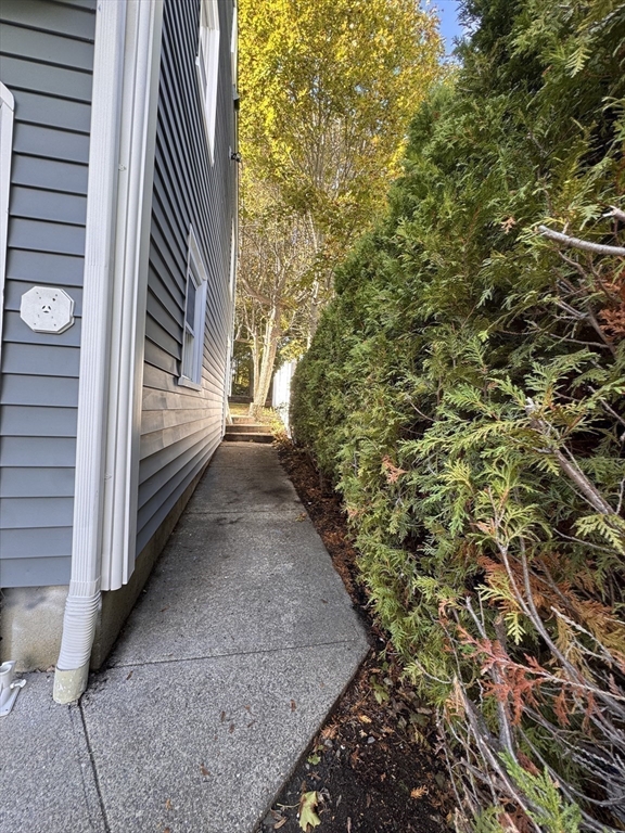 38 Middle Street Woburn, MA 01801 - Photo 34 of 39 a view of a pathway of a house