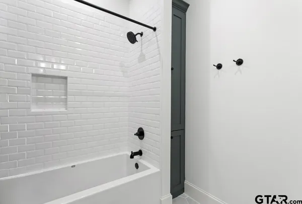a bathroom with a bathtub
